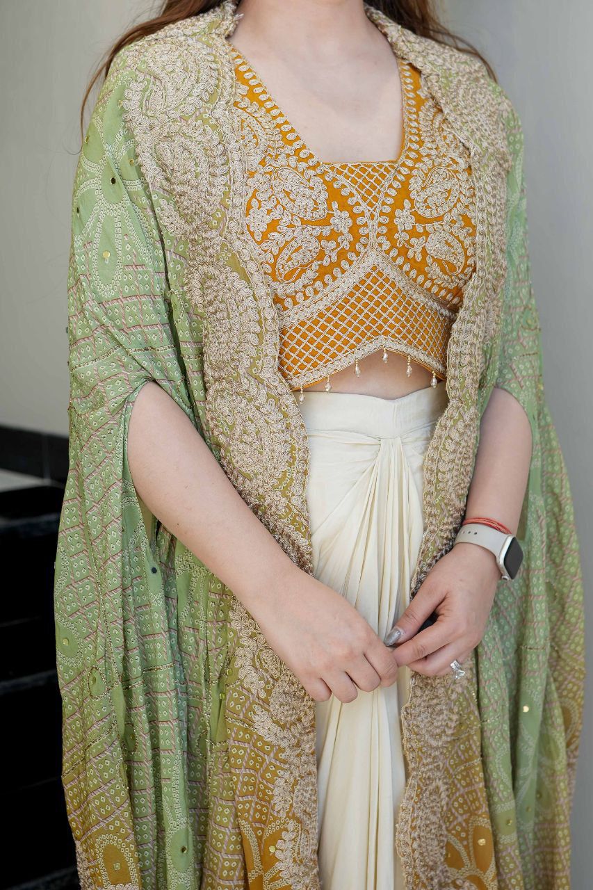 Embroidered Indian dhoti outfit featuring Banglory silk blouse and detailed sage green shrug