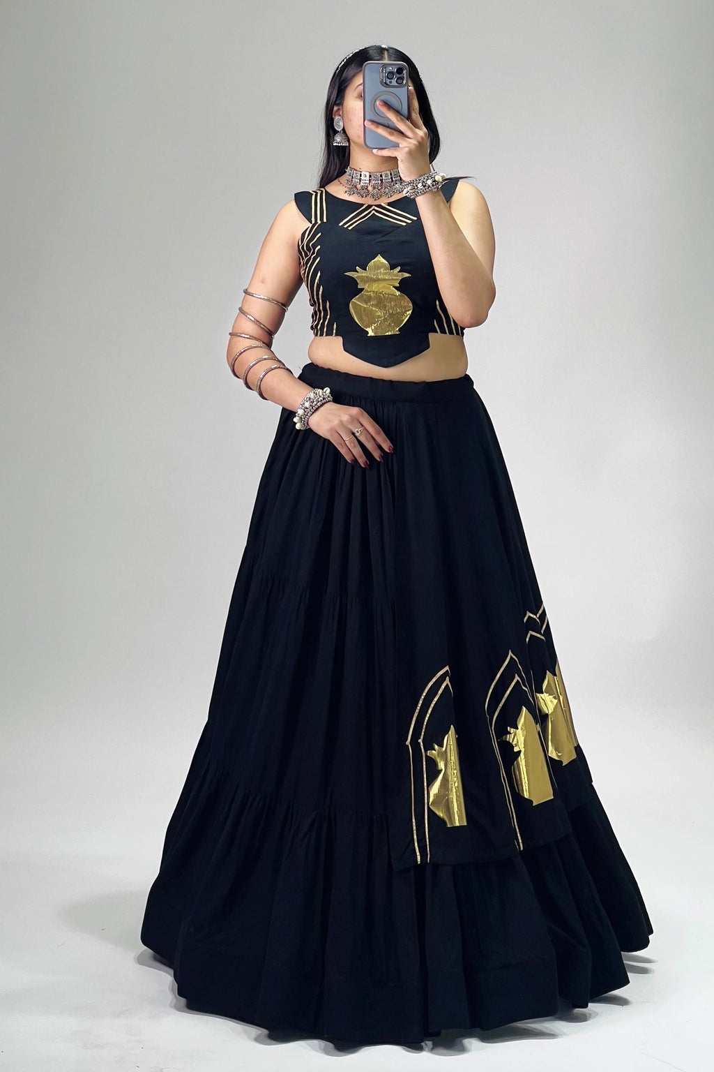 Black chaniya choli with golden Kalash patch work and 6-meter flared lehenga