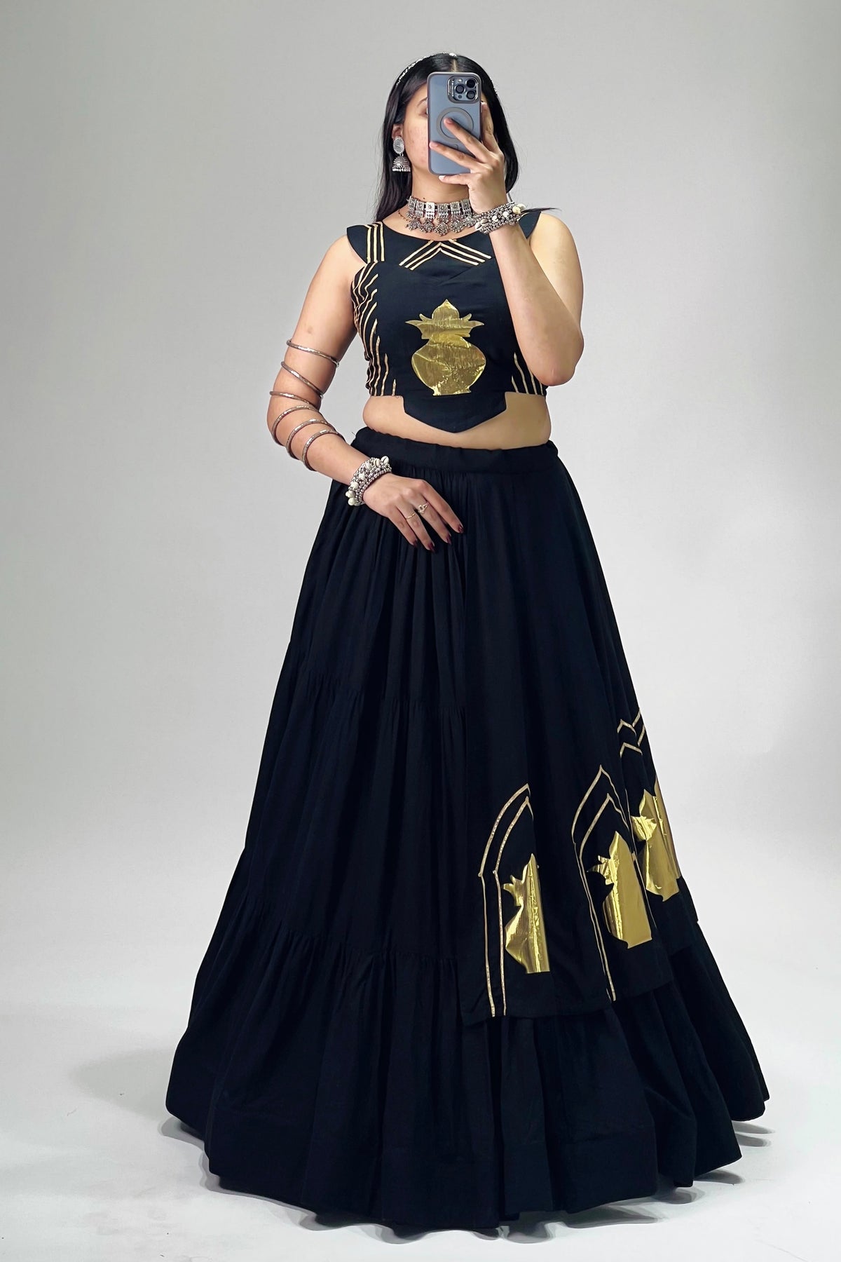 Black chaniya choli with golden Kalash patch work and 6-meter flared lehenga