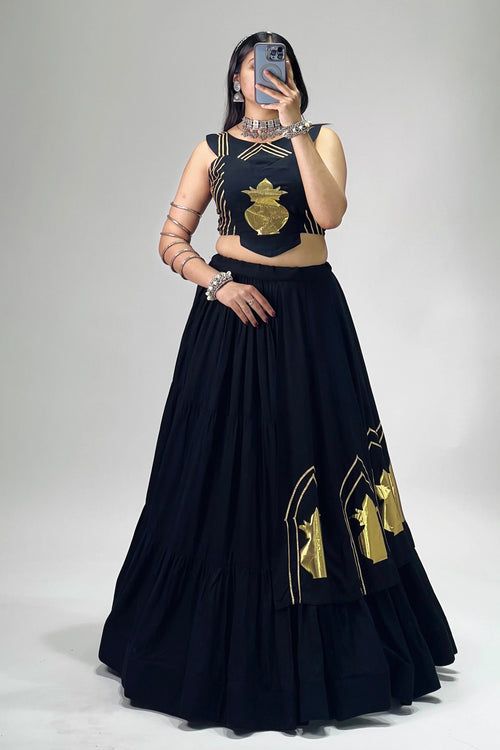 Black chaniya choli with golden Kalash patch work and 6-meter flared lehenga