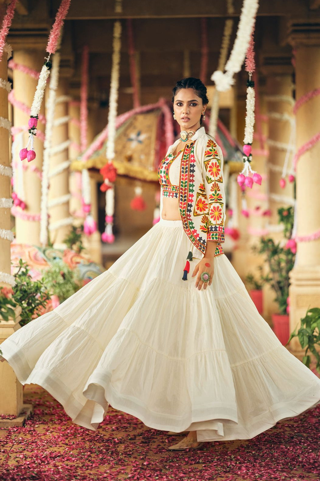Full-length cotton lehenga choli showing the flowing three-layer ruffle skirt and embroidered koti