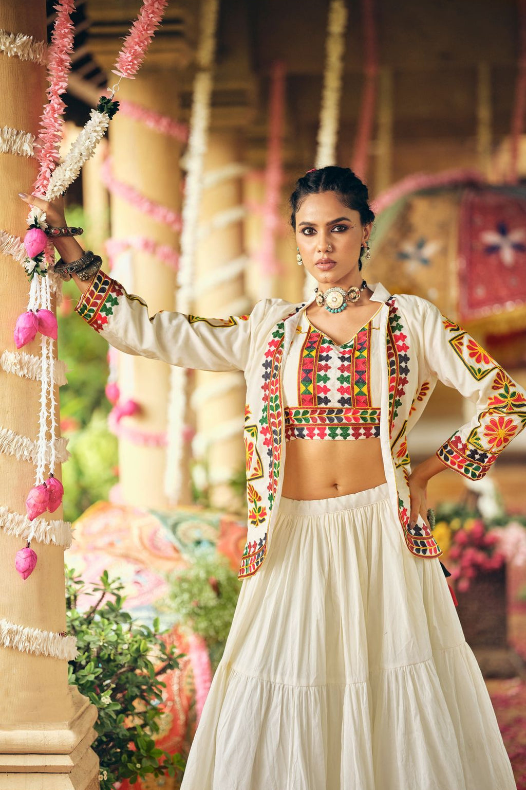 Cotton lehenga choli styled with an embroidered koti for a traditional festive look