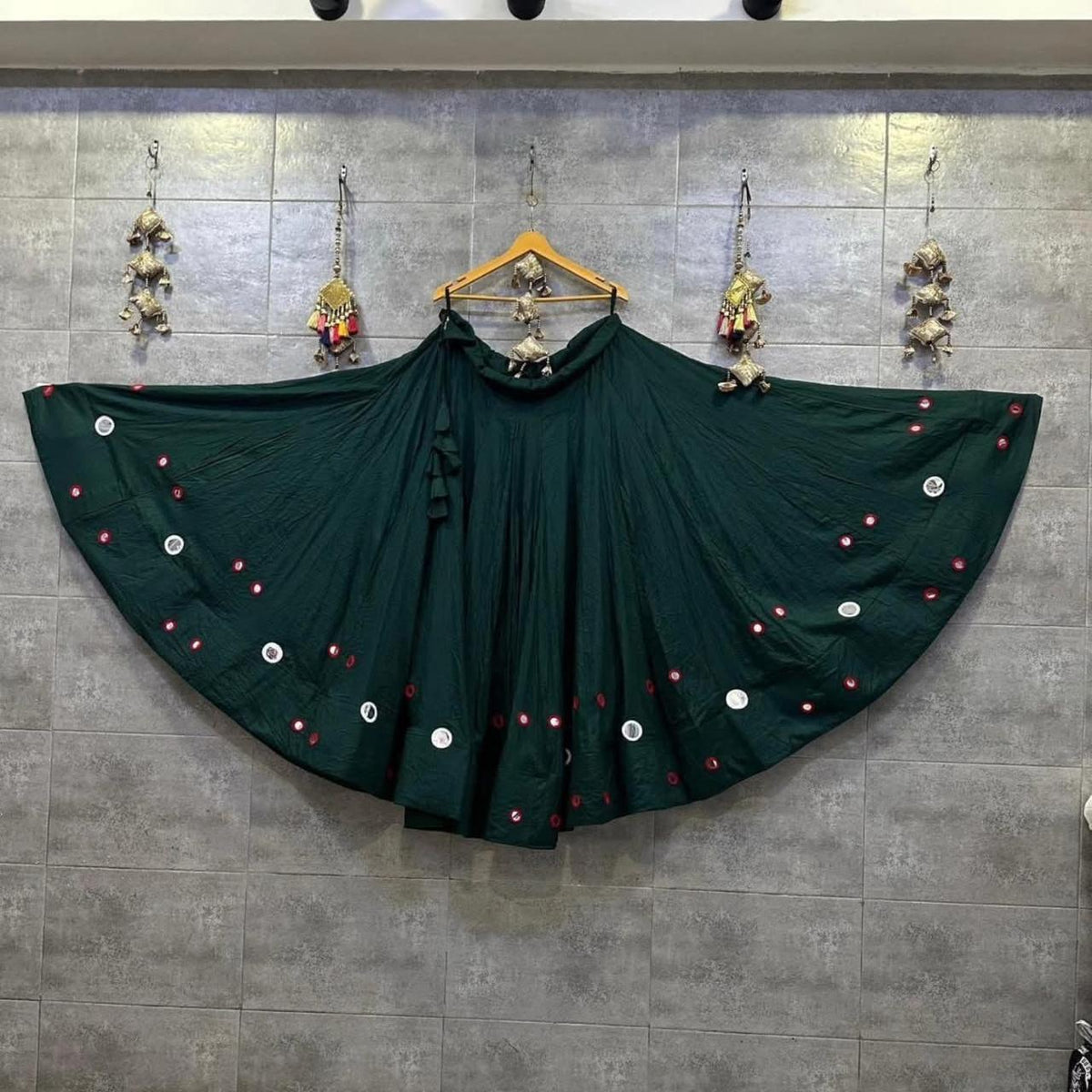 Dark green Indian Chaniya Choli with traditional decorative detailing and dupatta
