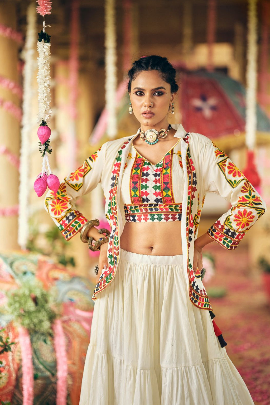Front view of embroidered cotton lehenga choli with matching blouse and colorful koti