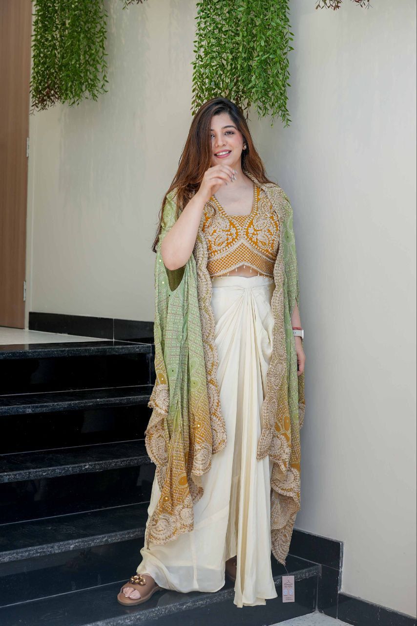 Indian festive dhoti set with ivory draped dhoti, mustard blouse and printed embroidered shrug