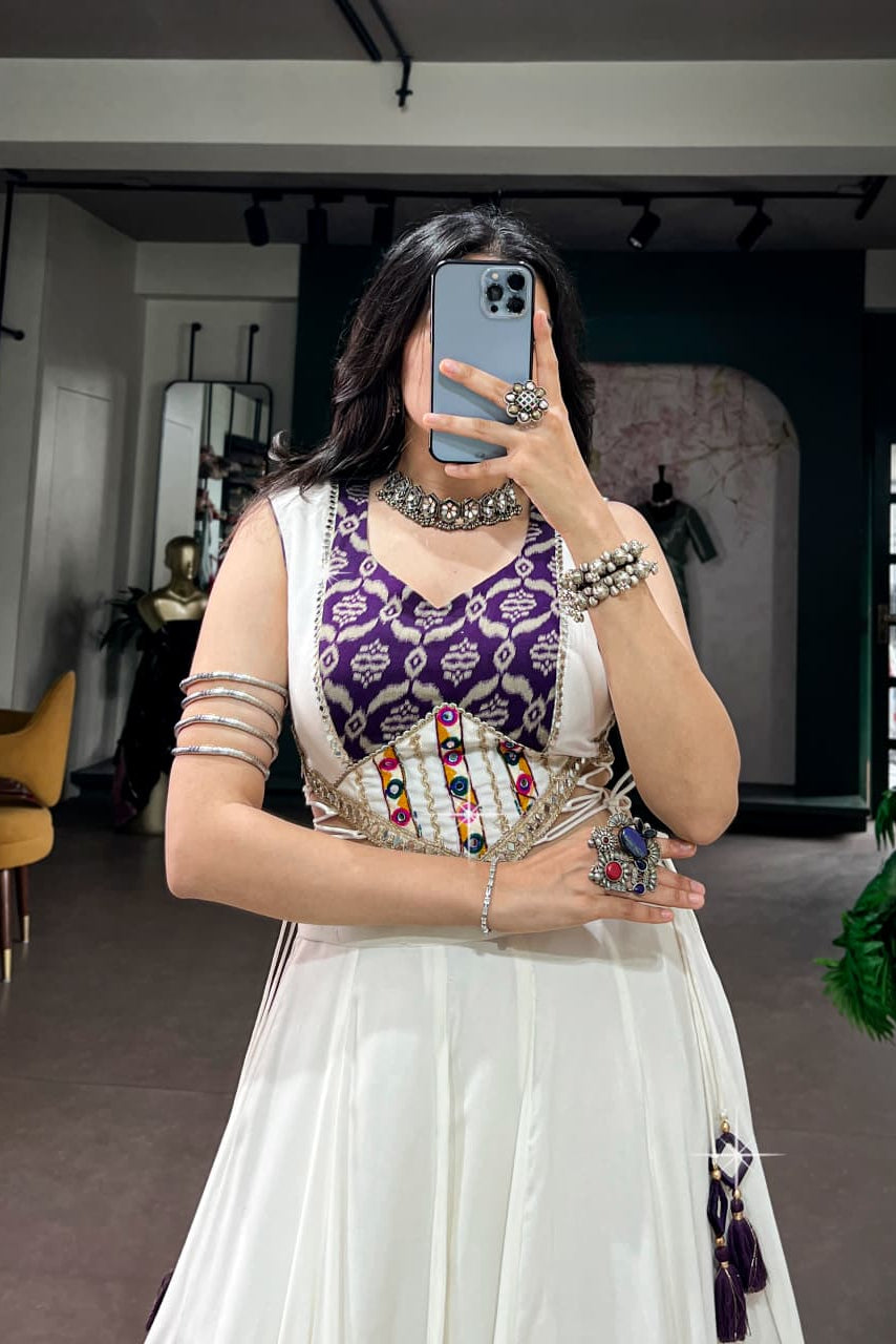 Gamthi mirror lace blouse detail on a white Navratri lehenga choli with purple heritage print