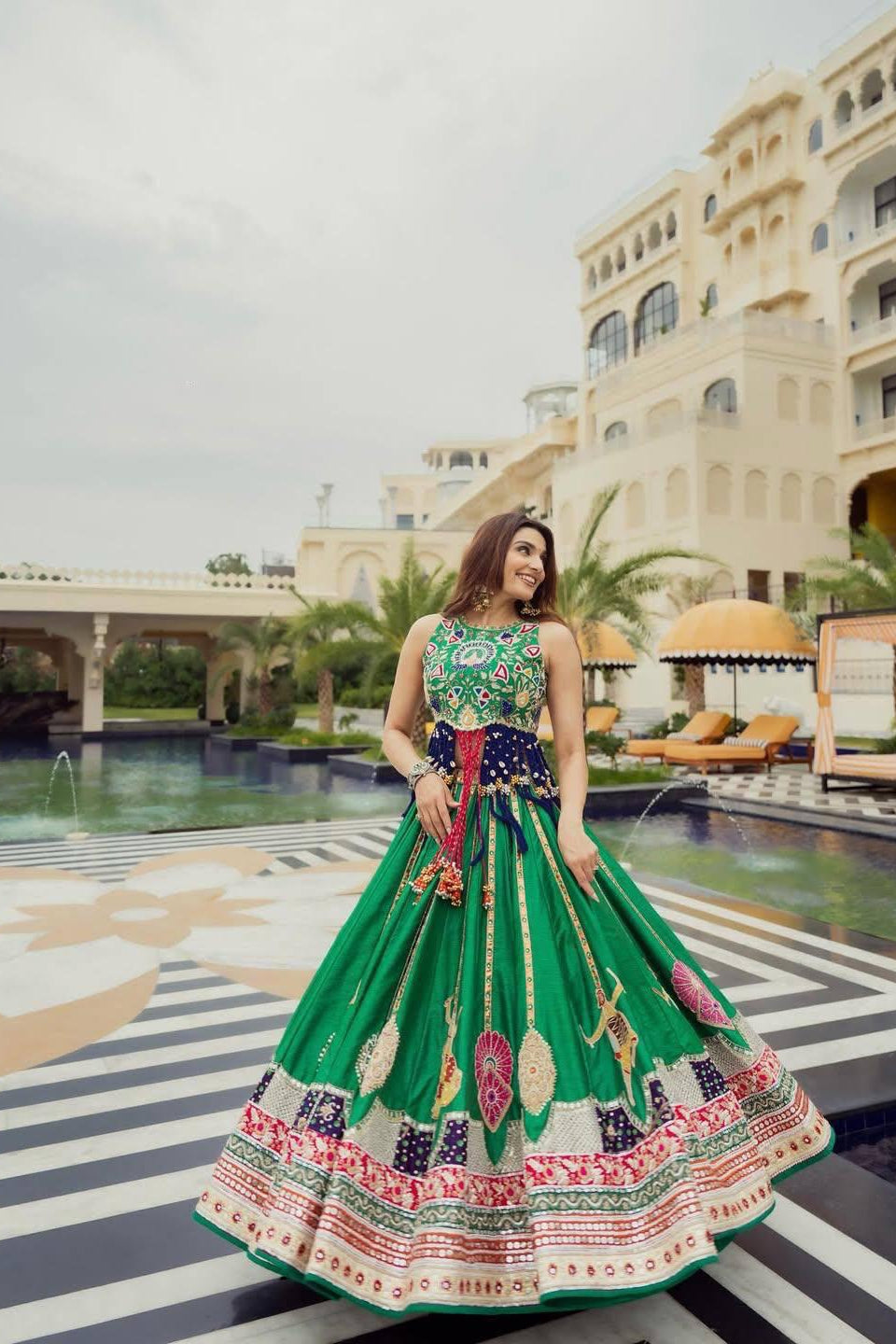 Green festive lehenga choli with colourful digital print and traditional-inspired motifs