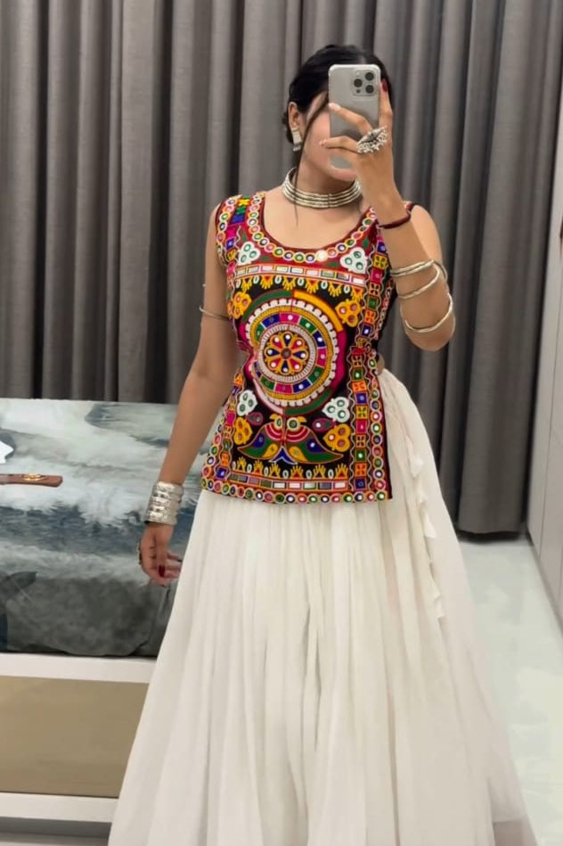 Front view of a multicolor embroidered Kediya Chaniya Choli paired with a white flared chaniya