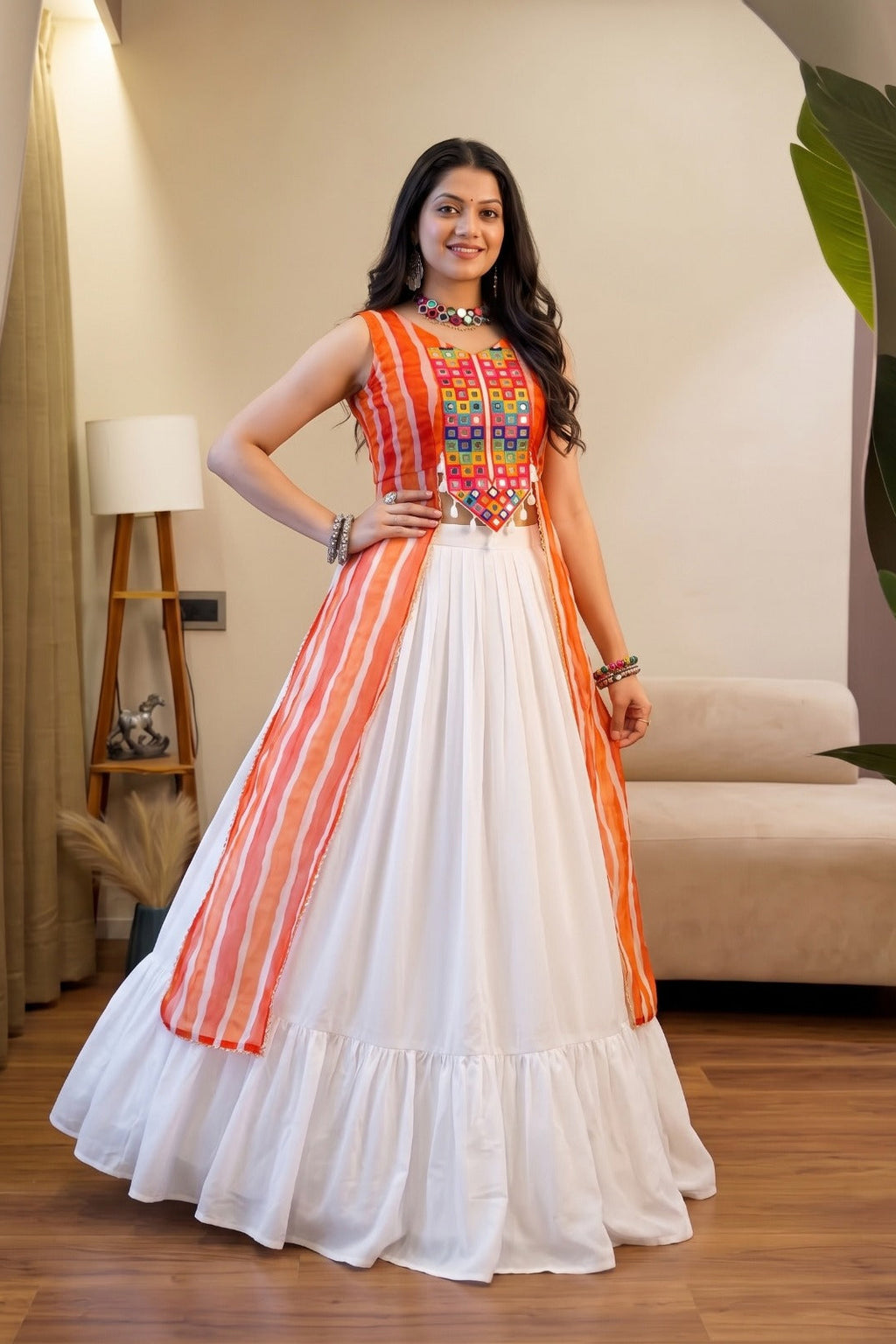 Traditional Leheriya lehenga with flowing white skirt and embellished top