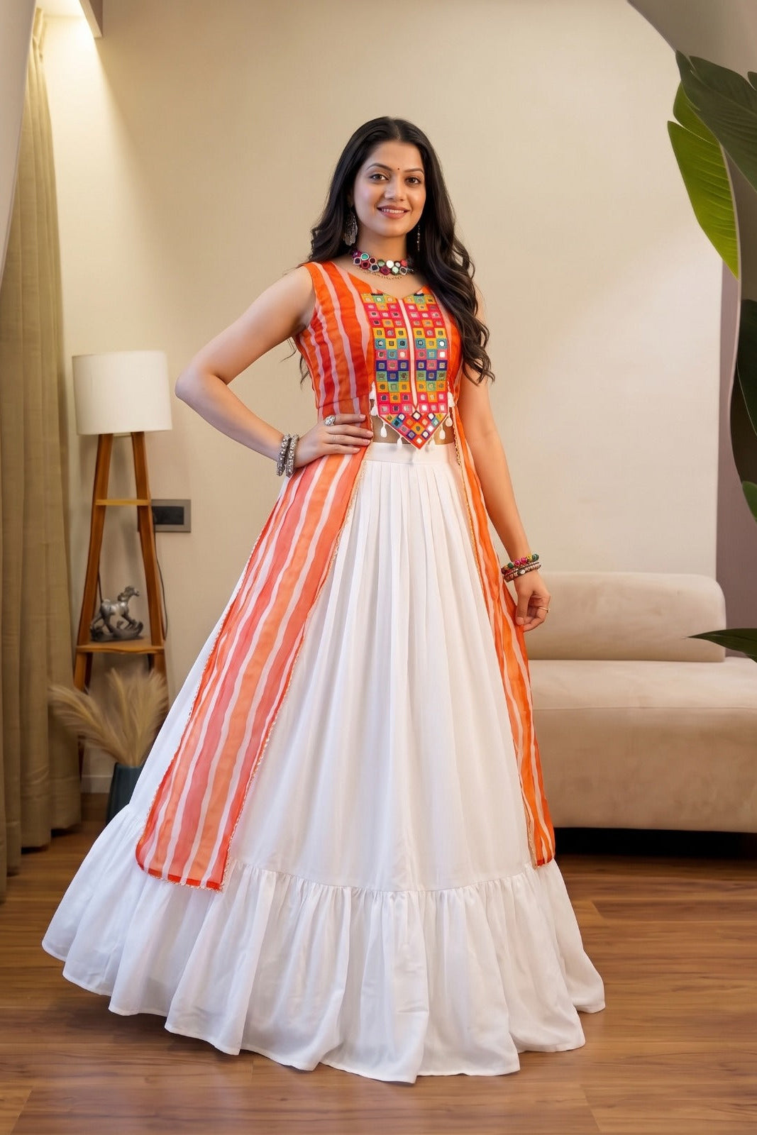 Traditional Leheriya lehenga with flowing white skirt and embellished top