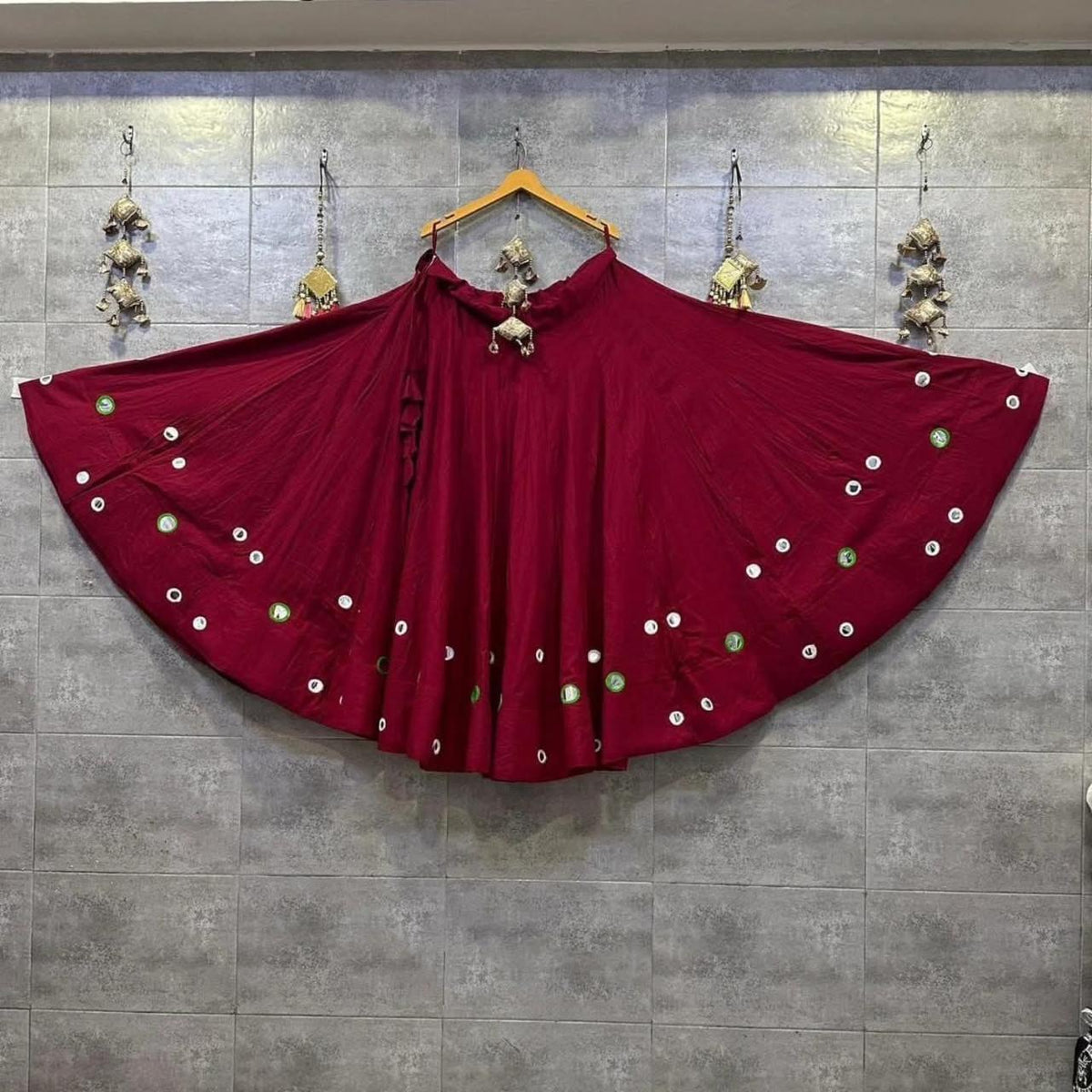 Maroon Indian Chaniya Choli with traditional detailing and matching blouse and dupatta