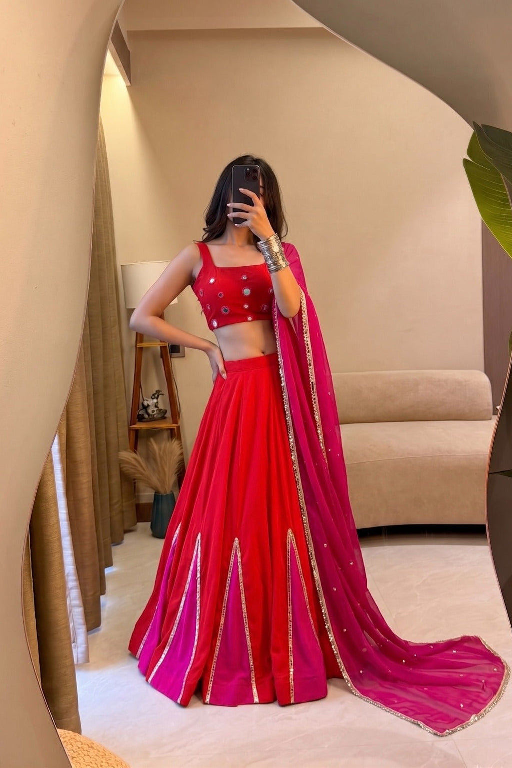 Mirror work Navratri lehenga choli styled with pink georgette dupatta