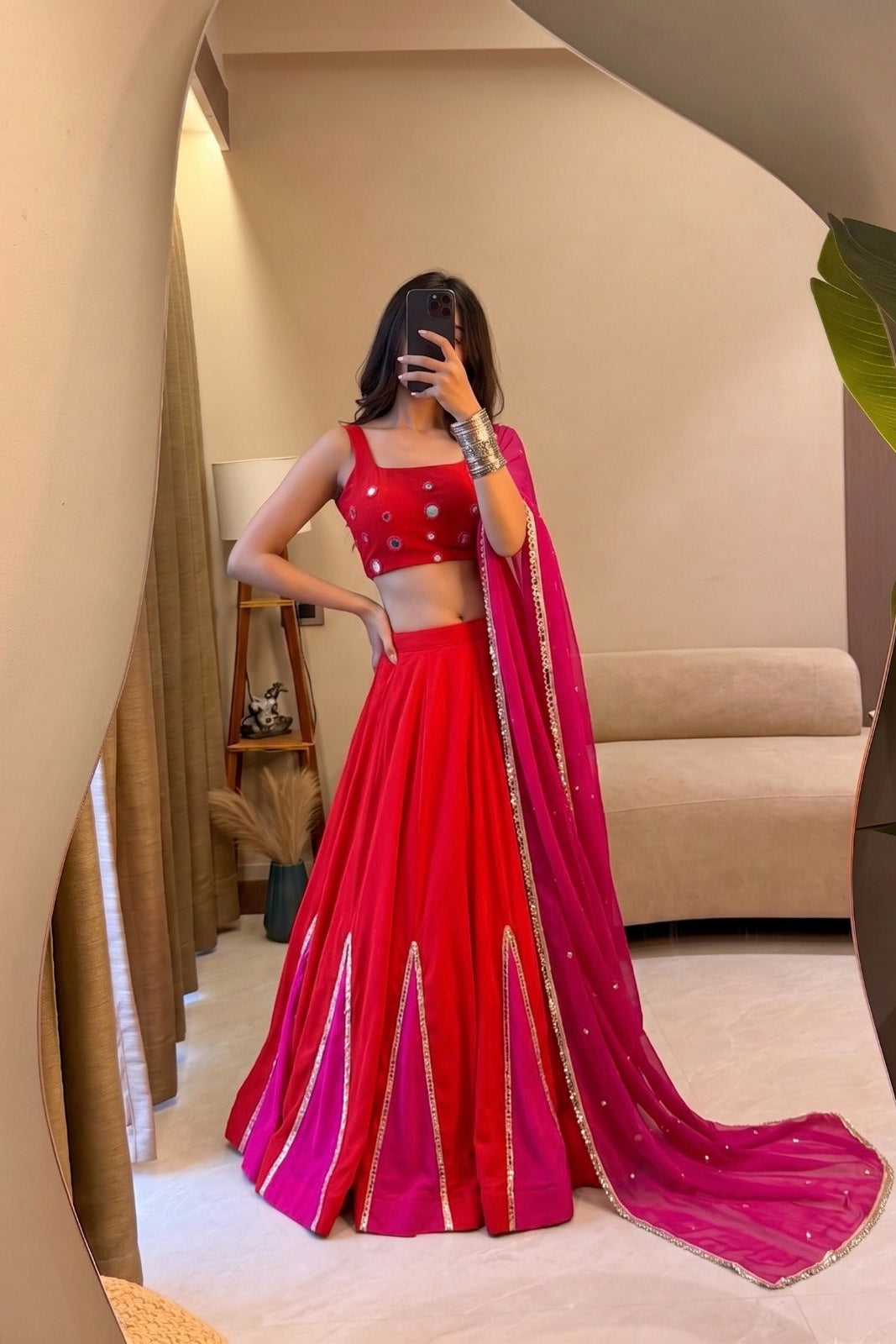 Mirror work Navratri lehenga choli styled with pink georgette dupatta