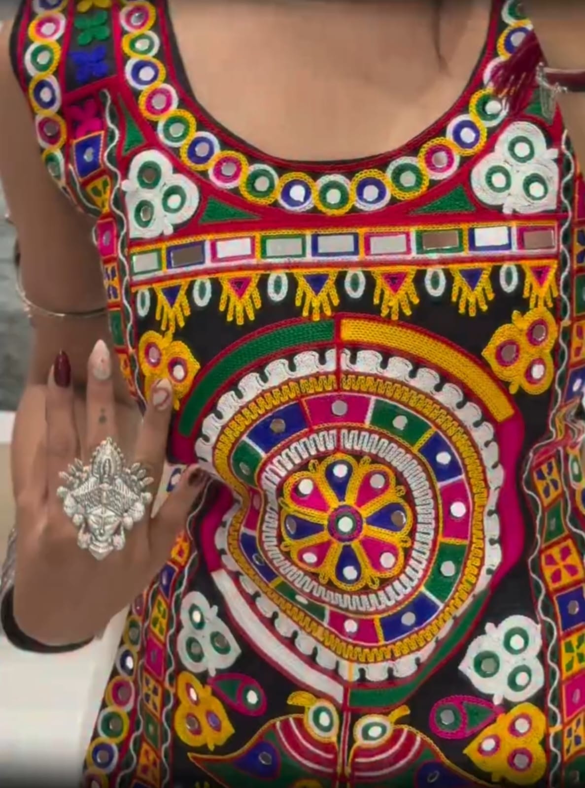 Close-up of multicolor embroidered Kediya Choli with traditional motifs for a Gujarati festive outfit