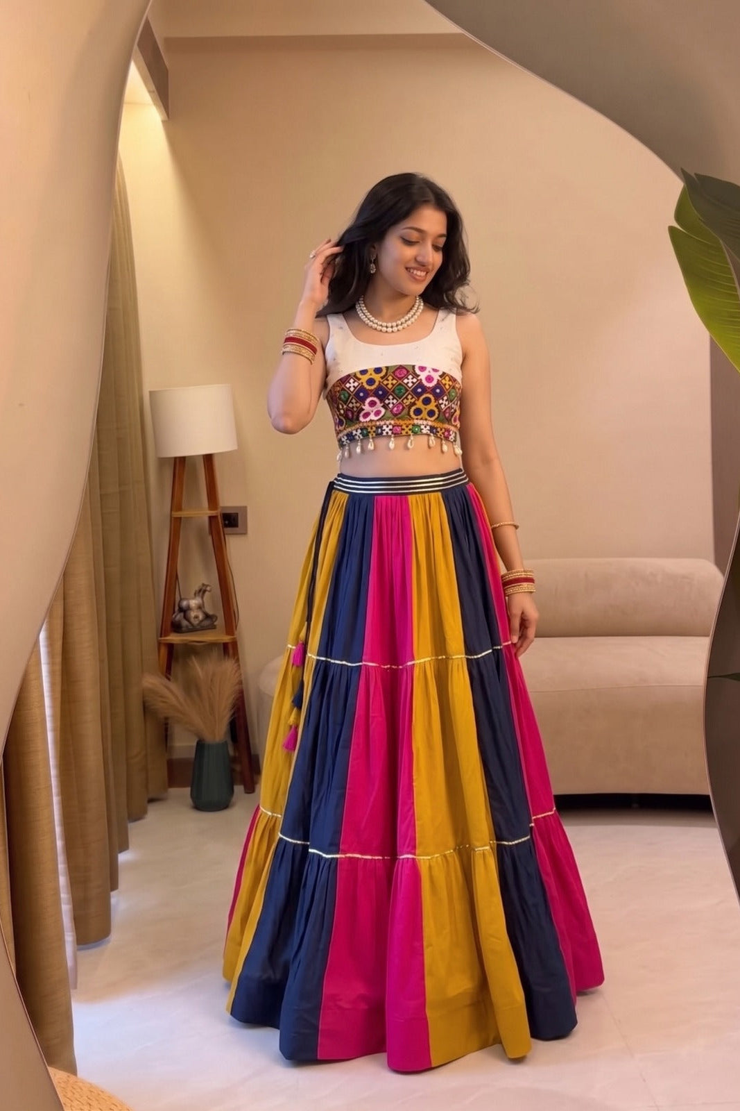 Multicolor Gamthi work lehenga choli styled for a festive Indian look