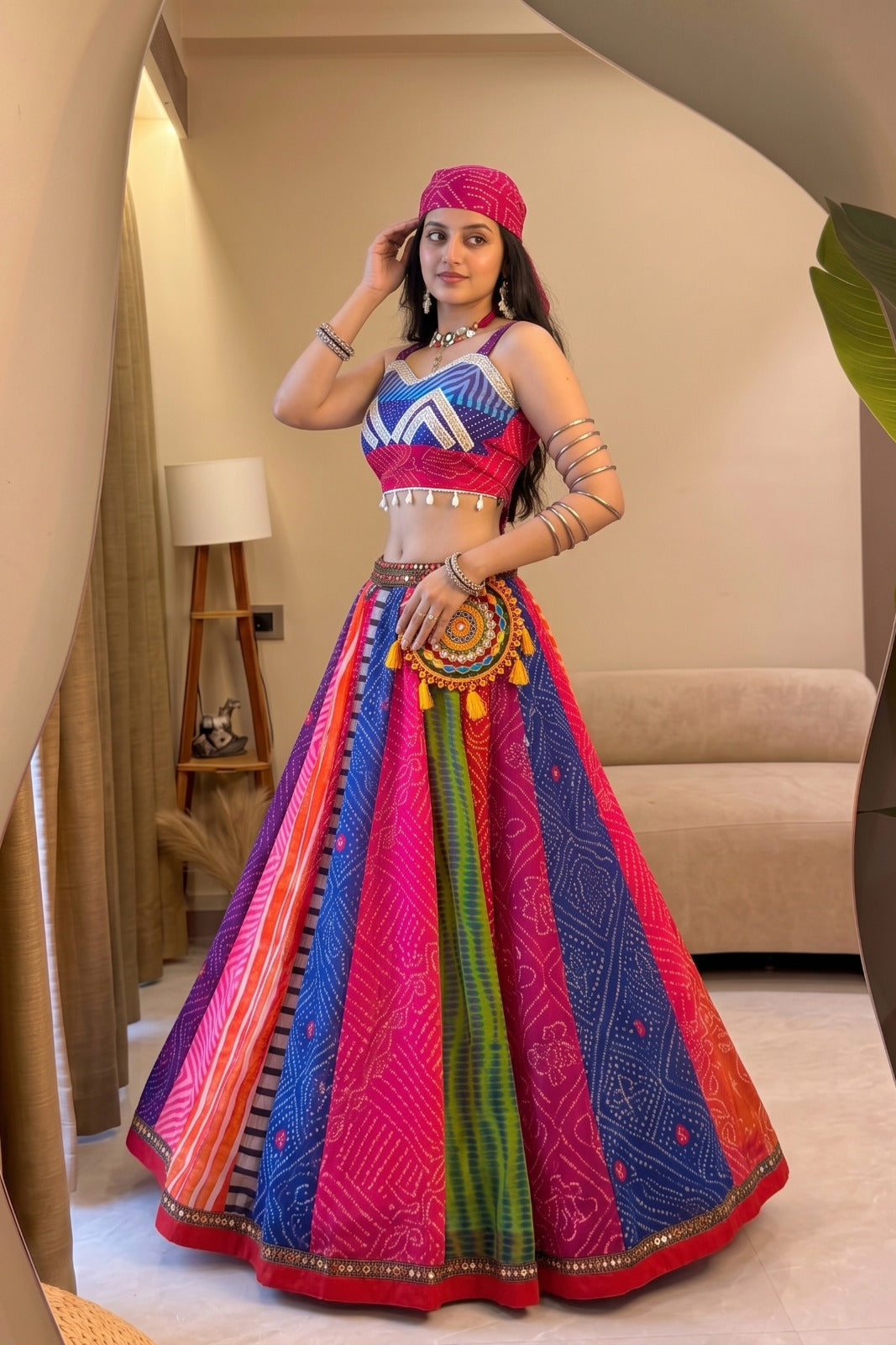 Multicolor Garba lehenga choli showing the flowing skirt, printed panels and decorative waist detailing