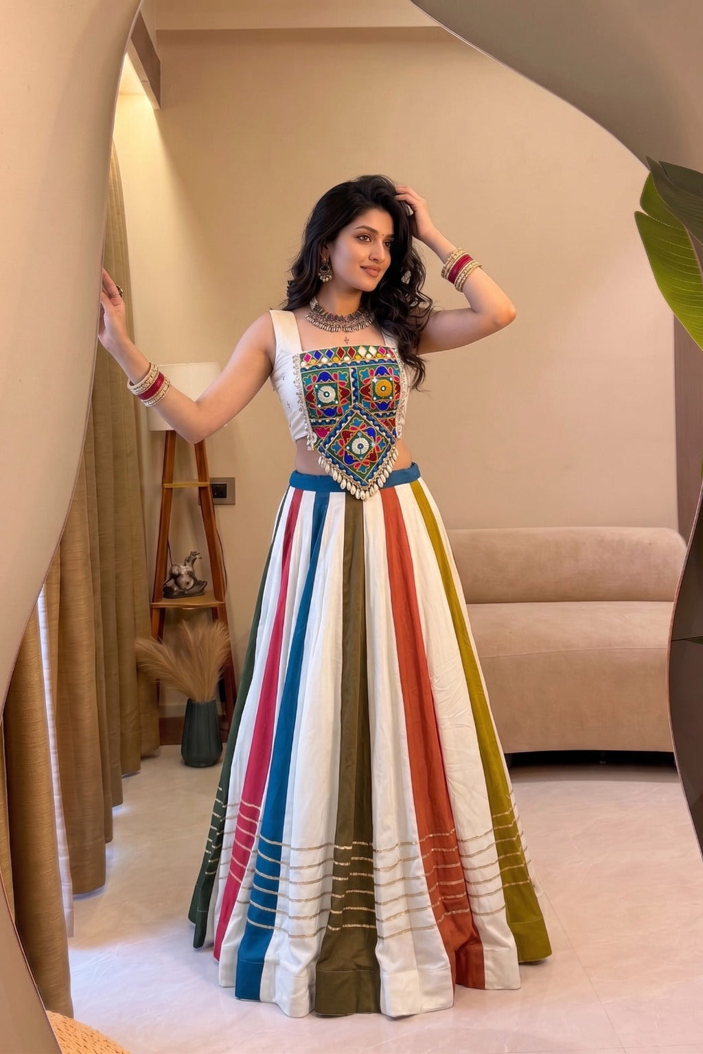Front view of a multicolor lehenga choli with traditional Gamthi mirror work and Gota Patti detailing