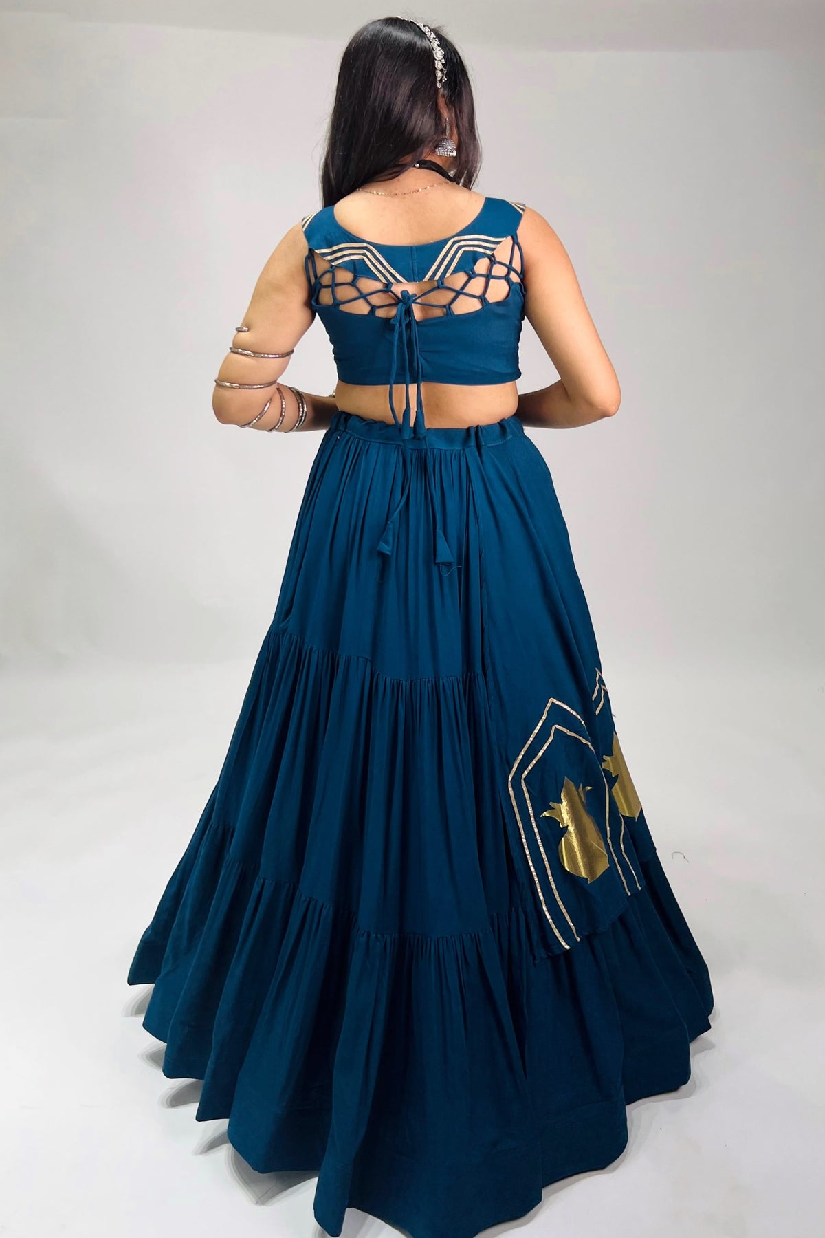 Back view of Chitra Navratri Chaniya Choli showing dori blouse closure and lehenga design