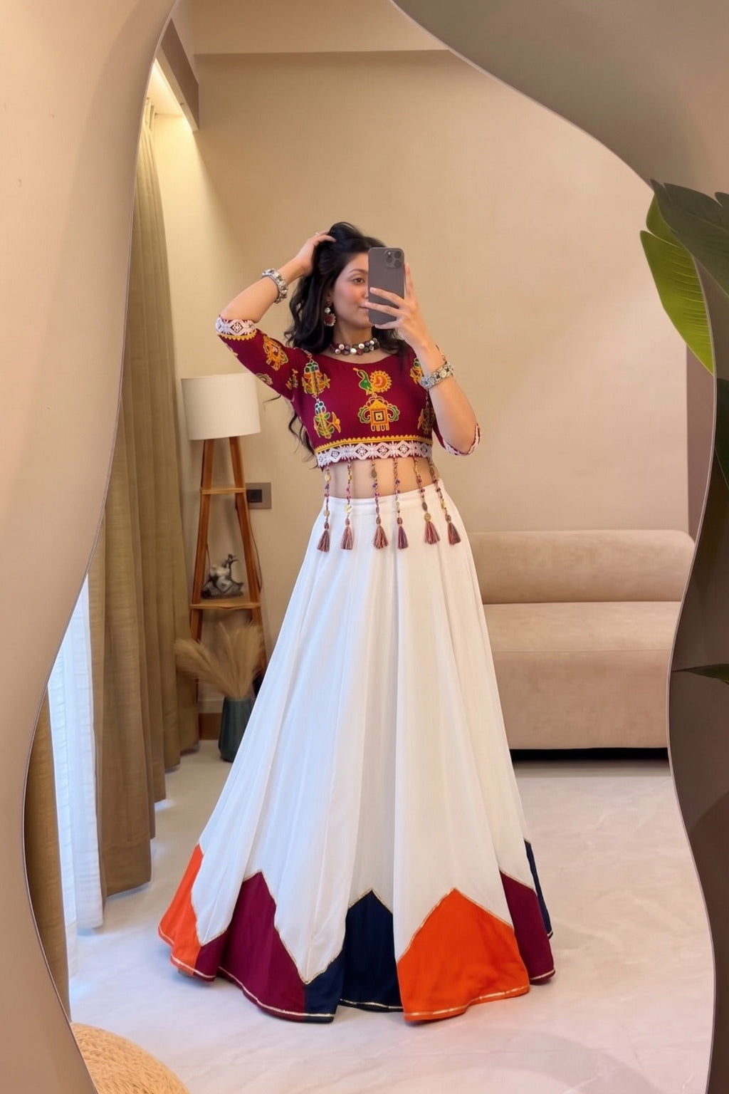 Traditional Navratri chaniya choli with maroon blouse and multicolor lehenga border