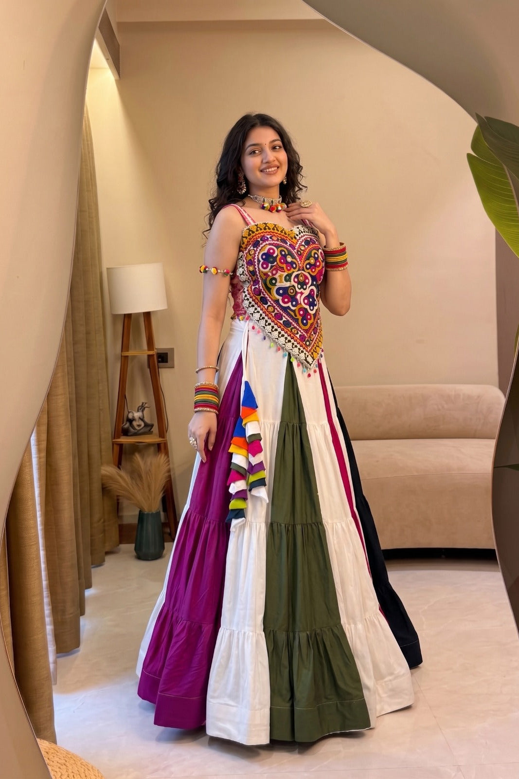 Multicolor Navratri chaniya choli featuring traditional Kutchi work and mirror detailing