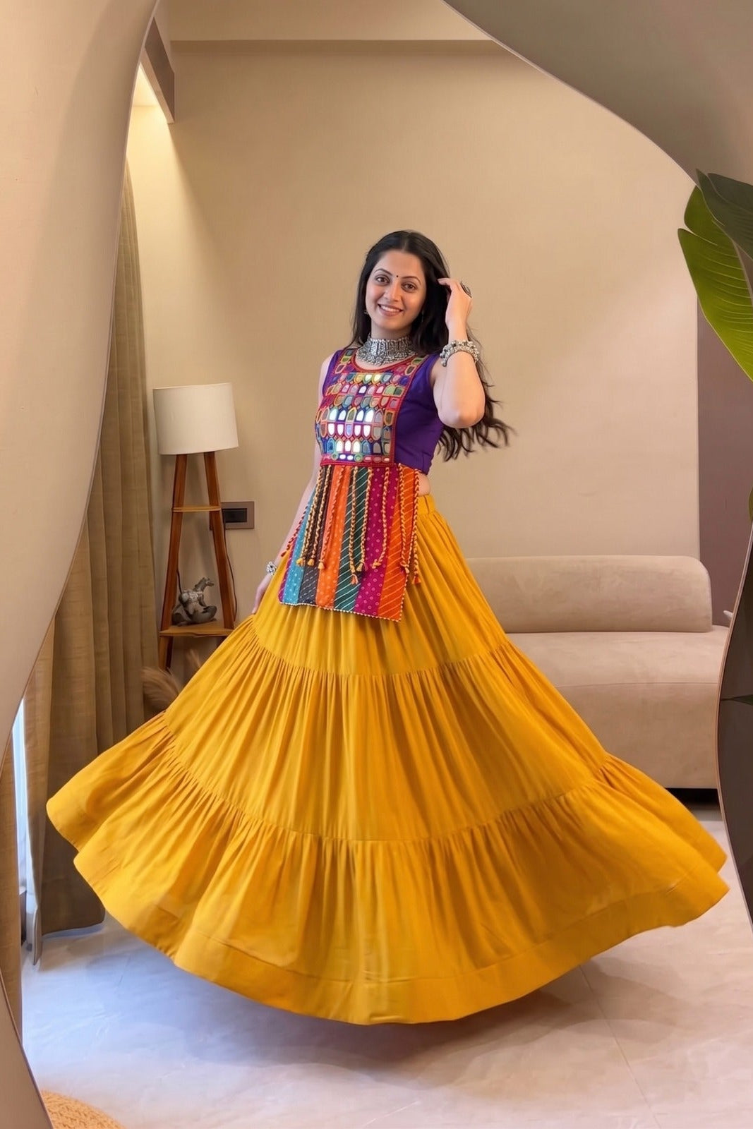 Yellow Navratri Chaniya Choli with mirror work blouse and flared lehenga