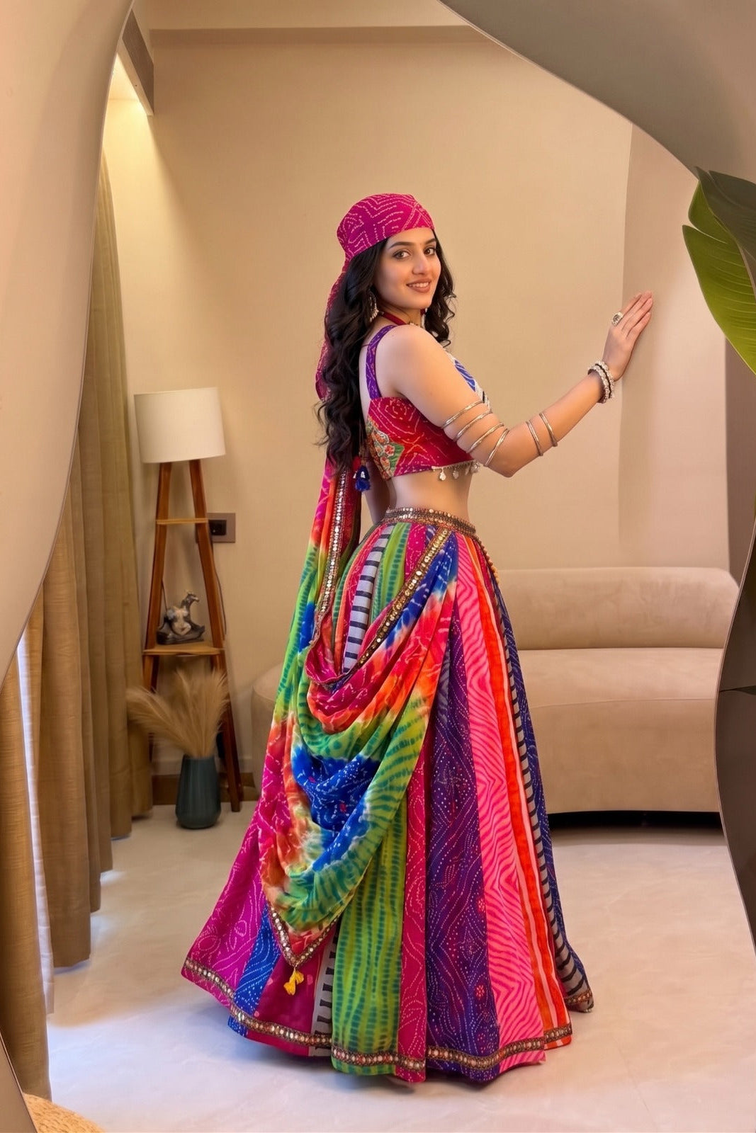 Multicolor Navratri lehenga choli showing the printed skirt and decorative border from the back