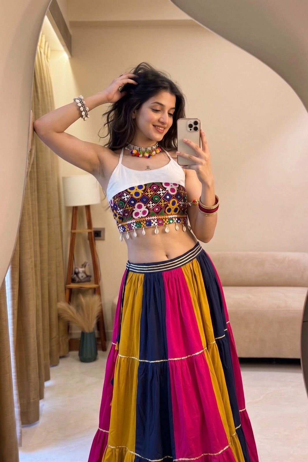 Festive Navratri lehenga choli showing the multicolor skirt and Gamthi work top