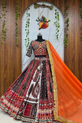 Printed mirror work lehenga choli with orange Georgette dupatta and colourful traditional print