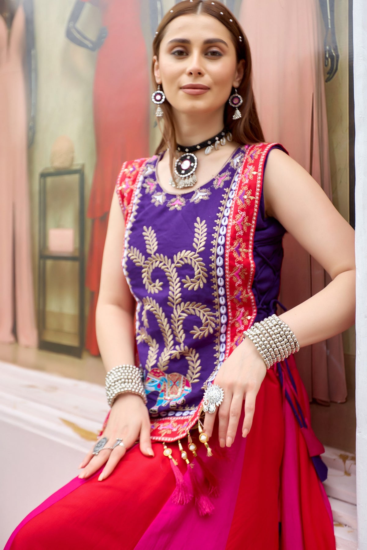 Purple embroidered shrug with thread work, decorative border and fancy latkan