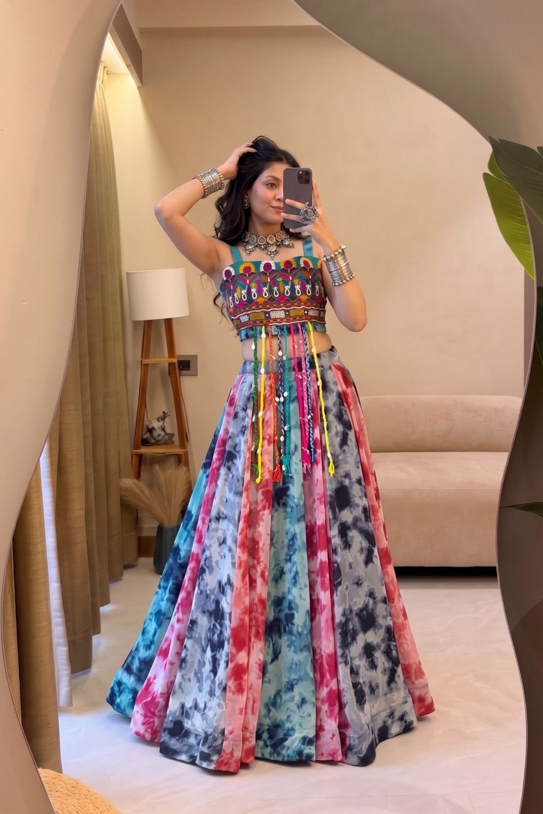 Shibori print lehenga and Gamthi work top styled with traditional jewellery