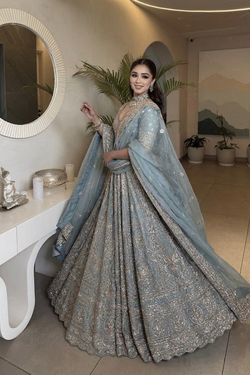Full look of slate blue wedding lehenga choli with embellished dupatta