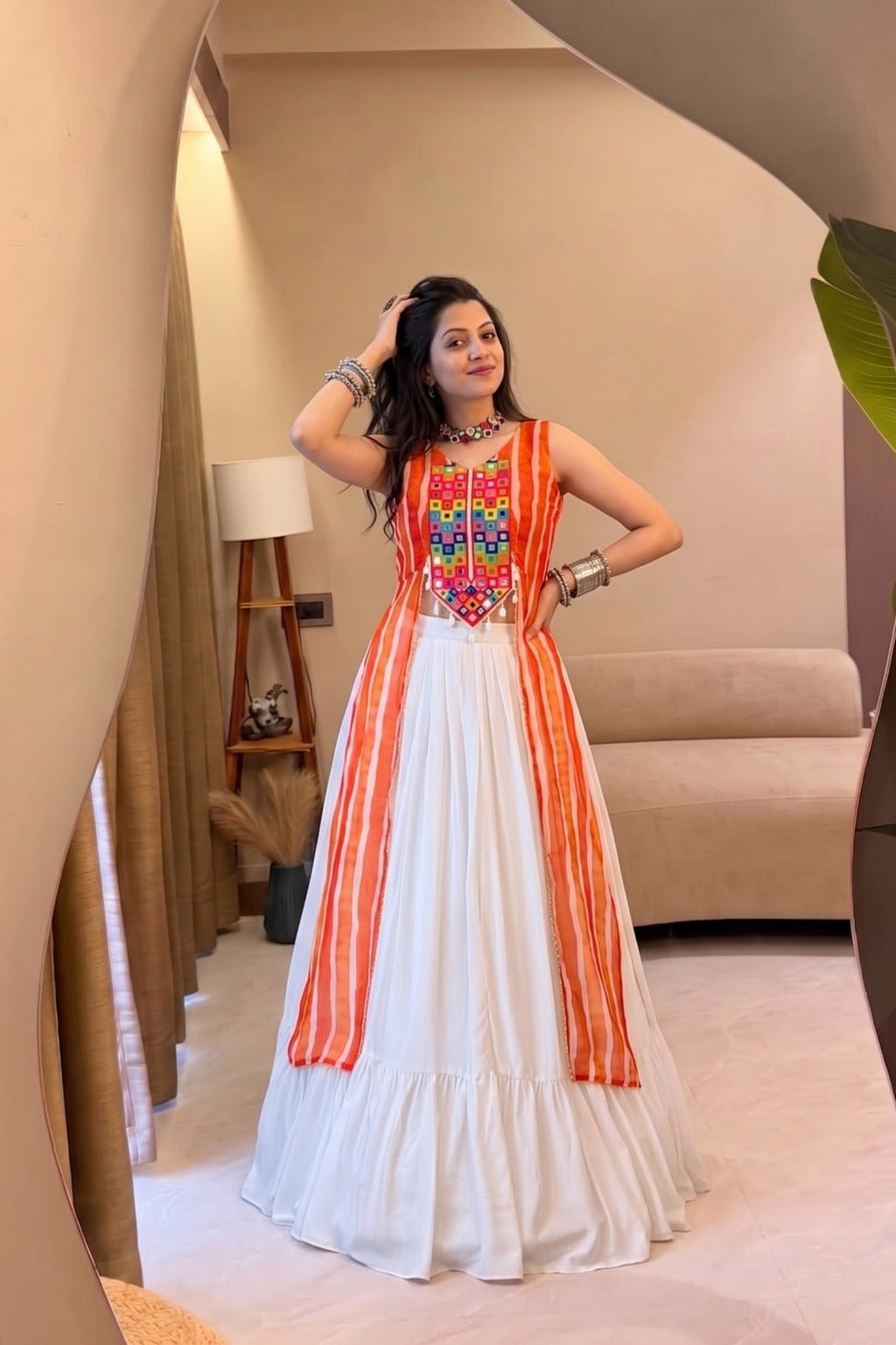 White ready to wear lehenga set with orange Leheriya striped top