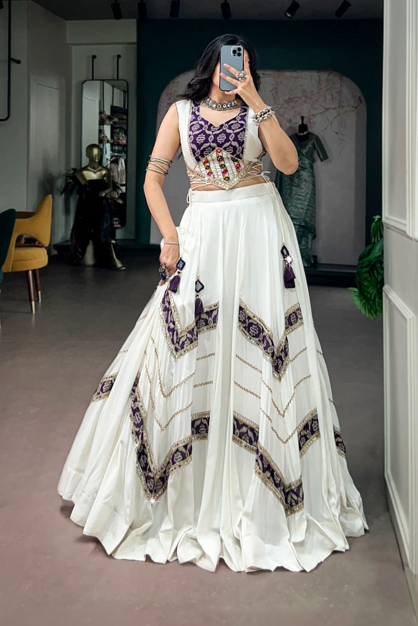 White Navratri lehenga choli with purple heritage print and Gamthi mirror lace blouse