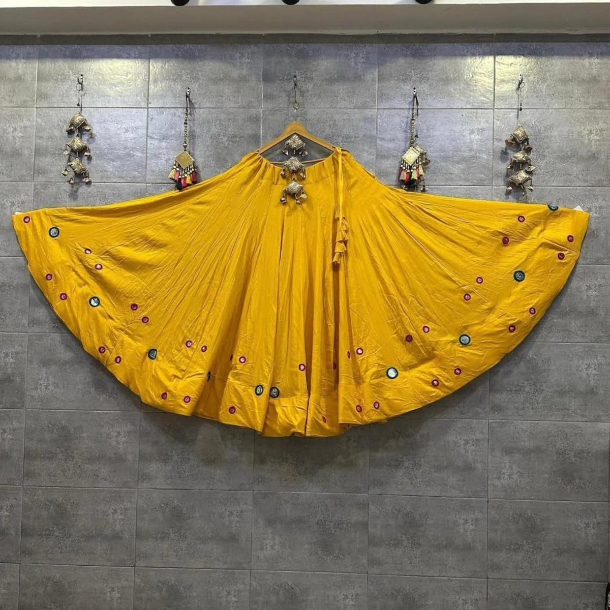 Yellow Indian Chaniya Choli set with flowing rayon cotton skirt and festive detailing